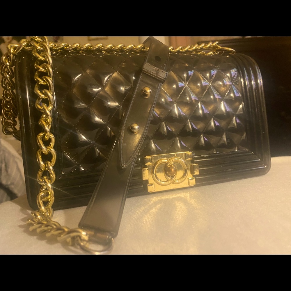 2022 jelly boy bag clear black gold details